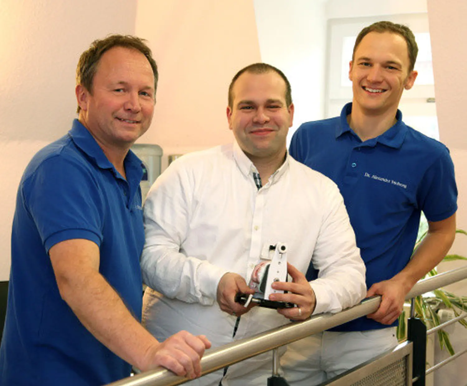 Dr. Rolf, Dr. Alexander Mohring und Zahntechnikermeister Tobias Mohring